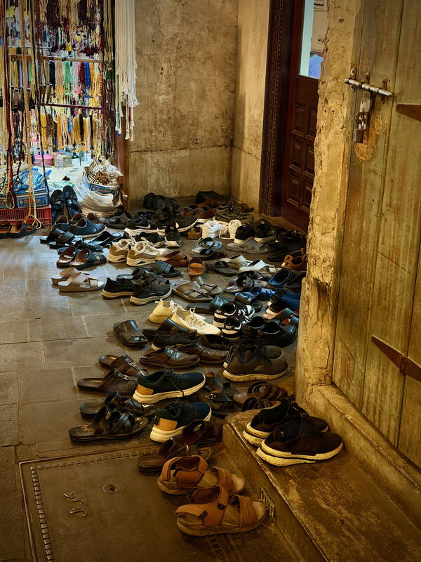 Shoes outside the Al-Ahmad Mosque