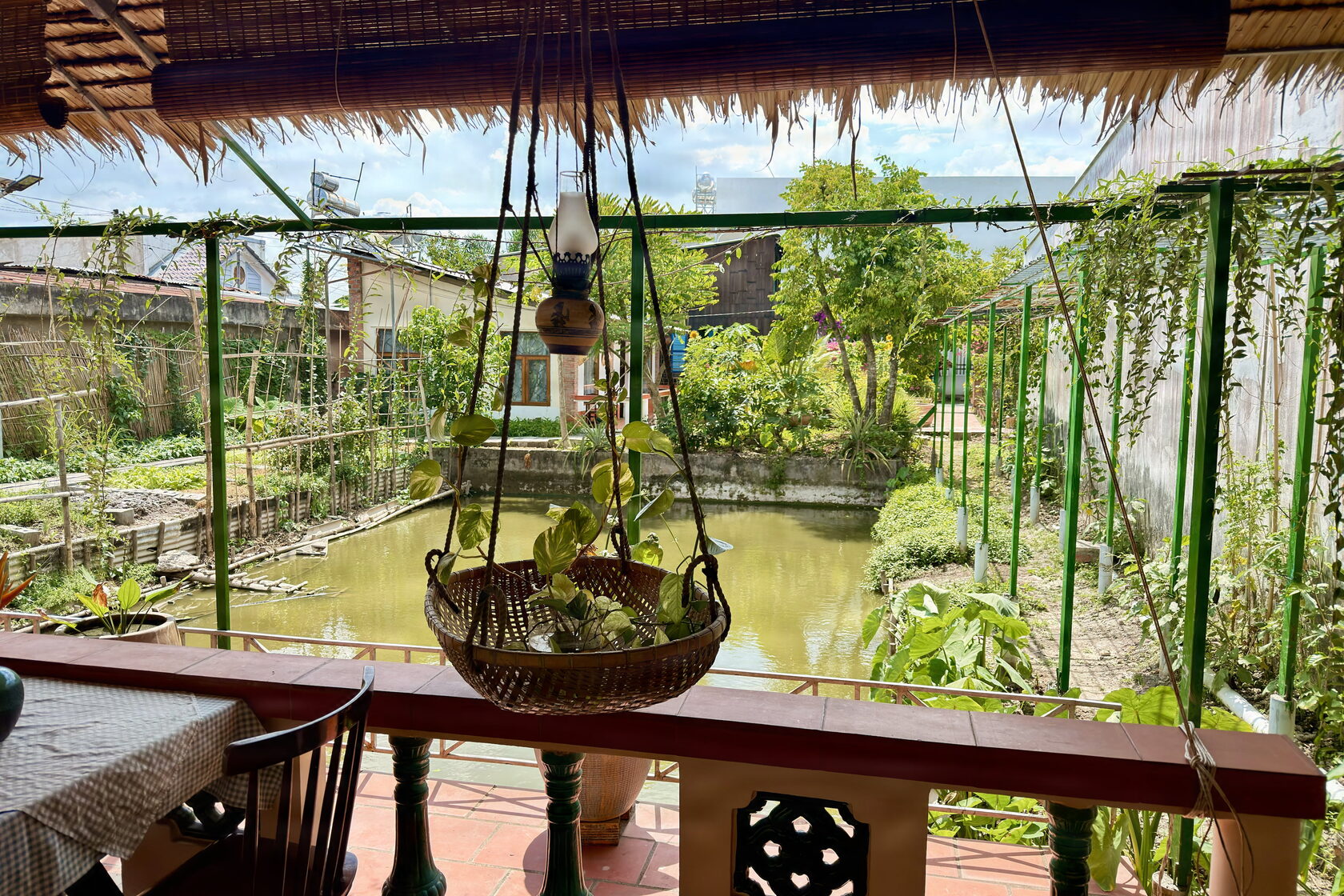 The green oasis homestay we booked, and the rain that welcomed us to Vĩnh Long.
