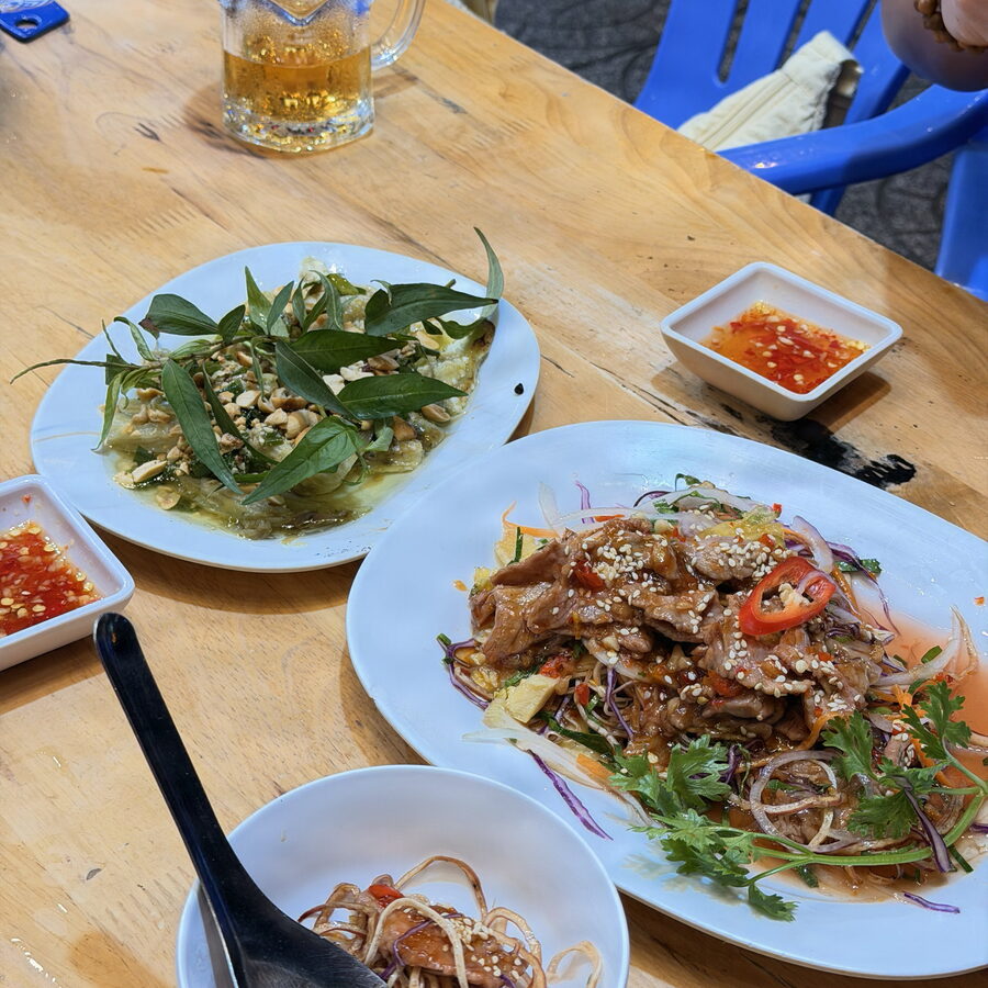 Cà Tím Nướng Mỡ Hành — braised eggplant with peanuts and scallion oil, back on the same menu at the same price.